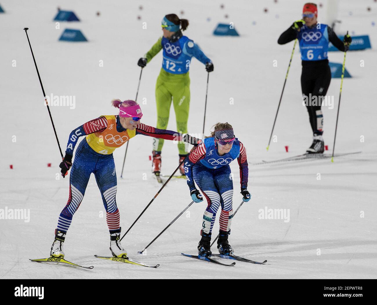 The United States' Kikkan Randall, left, touches teammate Jessie Diggins during an exchange in the Women's 4x5km Relay at Alpensia Cross-Country Centre during the Pyeongchang Winter Olympics on Saturday, Feb. 17, 2018. (Photo by Carlos Gonzalez/Minneapolis Star Tribune/TNS/Sipa USA) Stock Photo