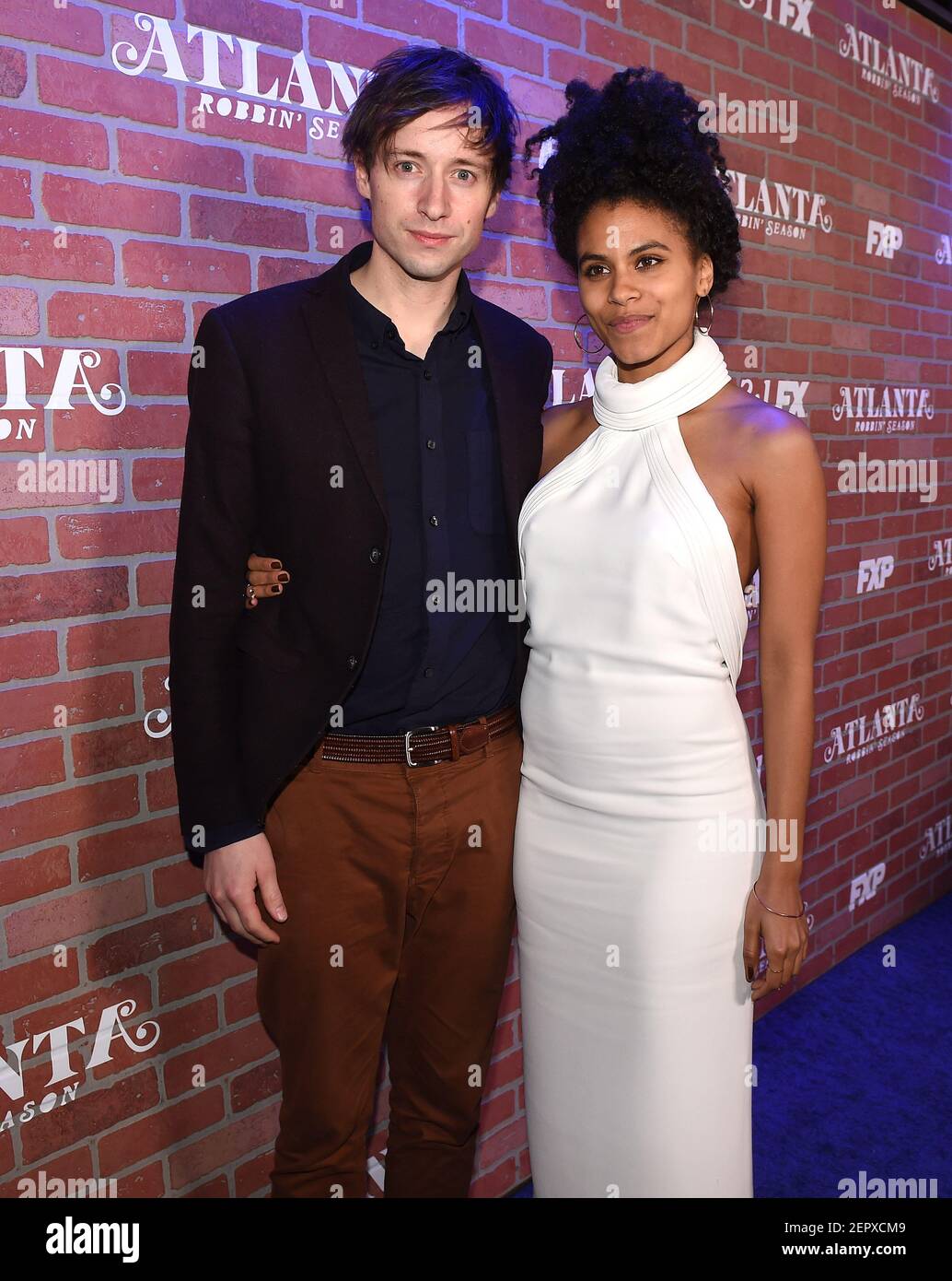 LOS ANGELES - FEBRUARY 19: Zazie Beetz, David Rysdahl arrives at the ...
