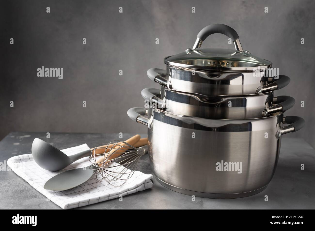 set of various cookware and utensils on dark background Stock Photo