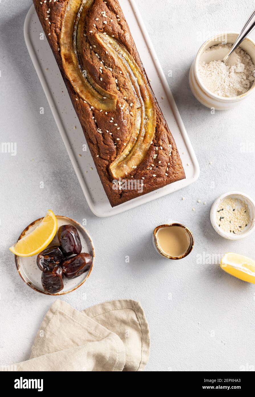 vegan buckwheat banana bread with dates, tahini, sesame seeds Stock
