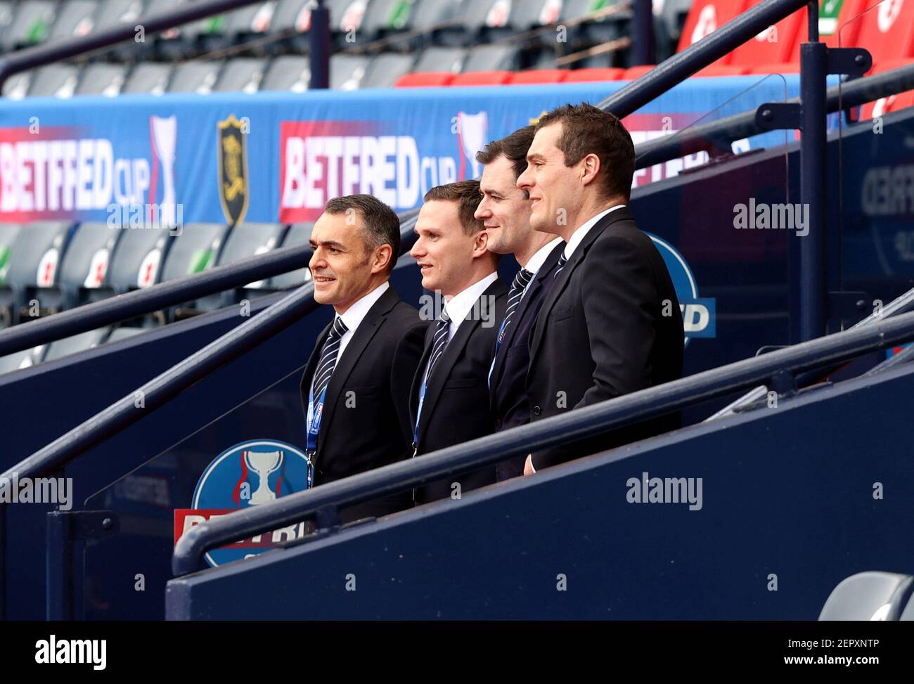 Referee Don Robertson (second right) and the other match officials pose