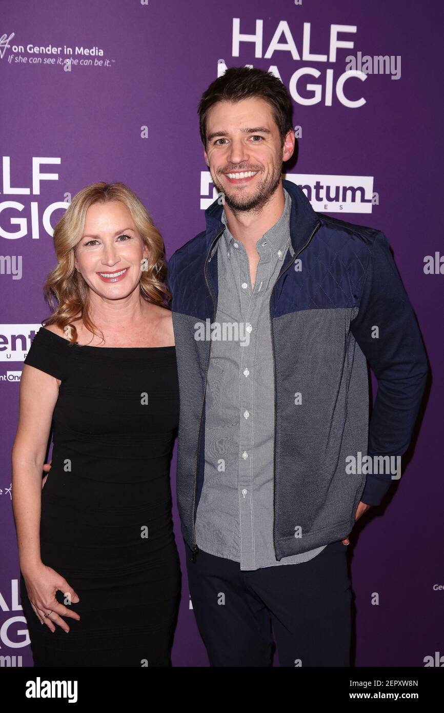 Angela Kinsey, Joshua Snyder arrive at the Los Angeles Premiere Of Momentum  Pictures' "Half Magic" held at The London West Hollywood on February 21,  2018 in West Hollywood, California, United States. (Photo