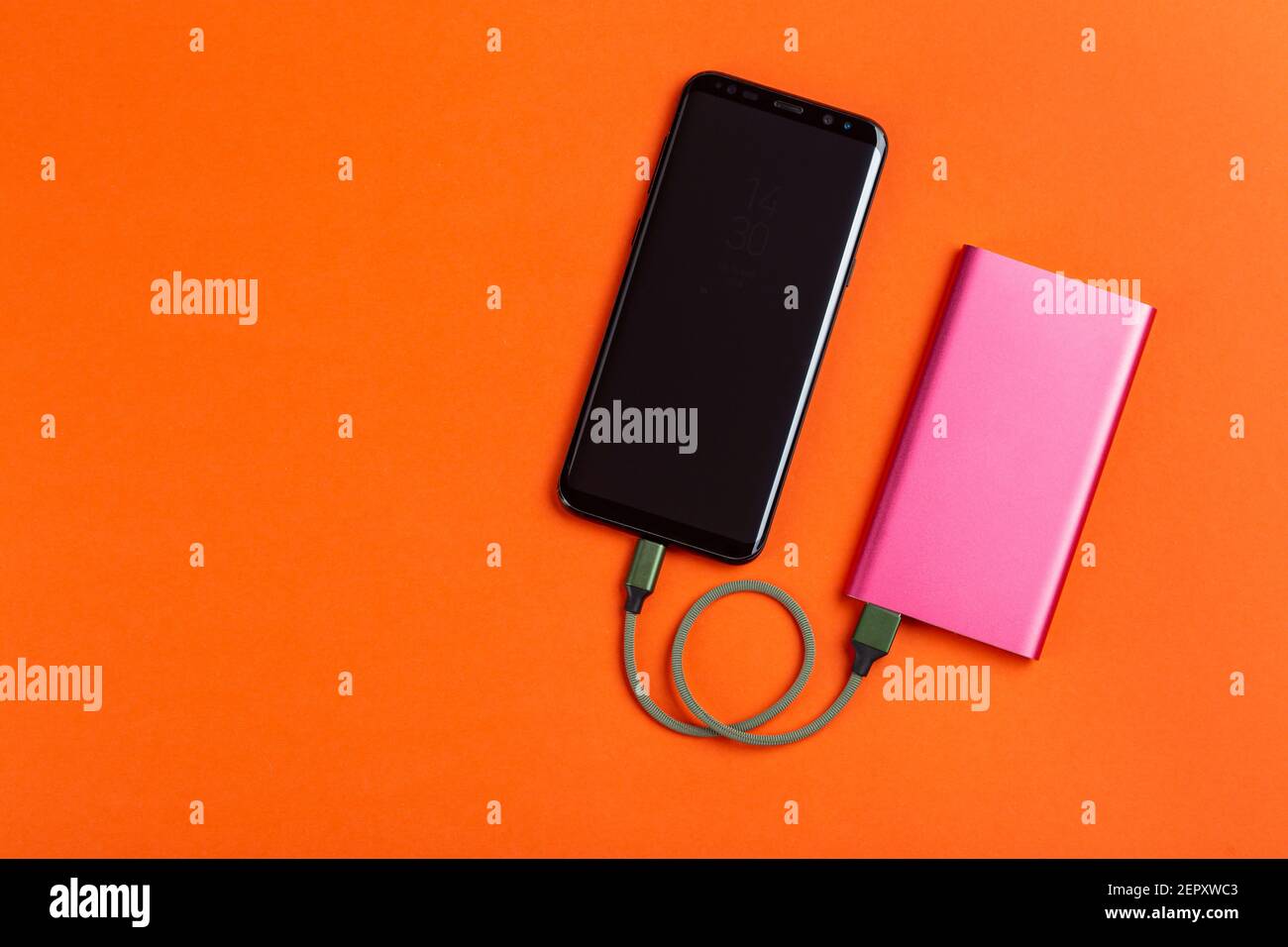 Smartphone charging with power bank. Portable power bank for charging