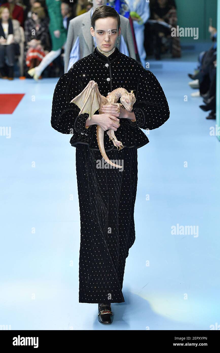 Model Oslo Grace walks on the runway during the Gucci Fashion Show