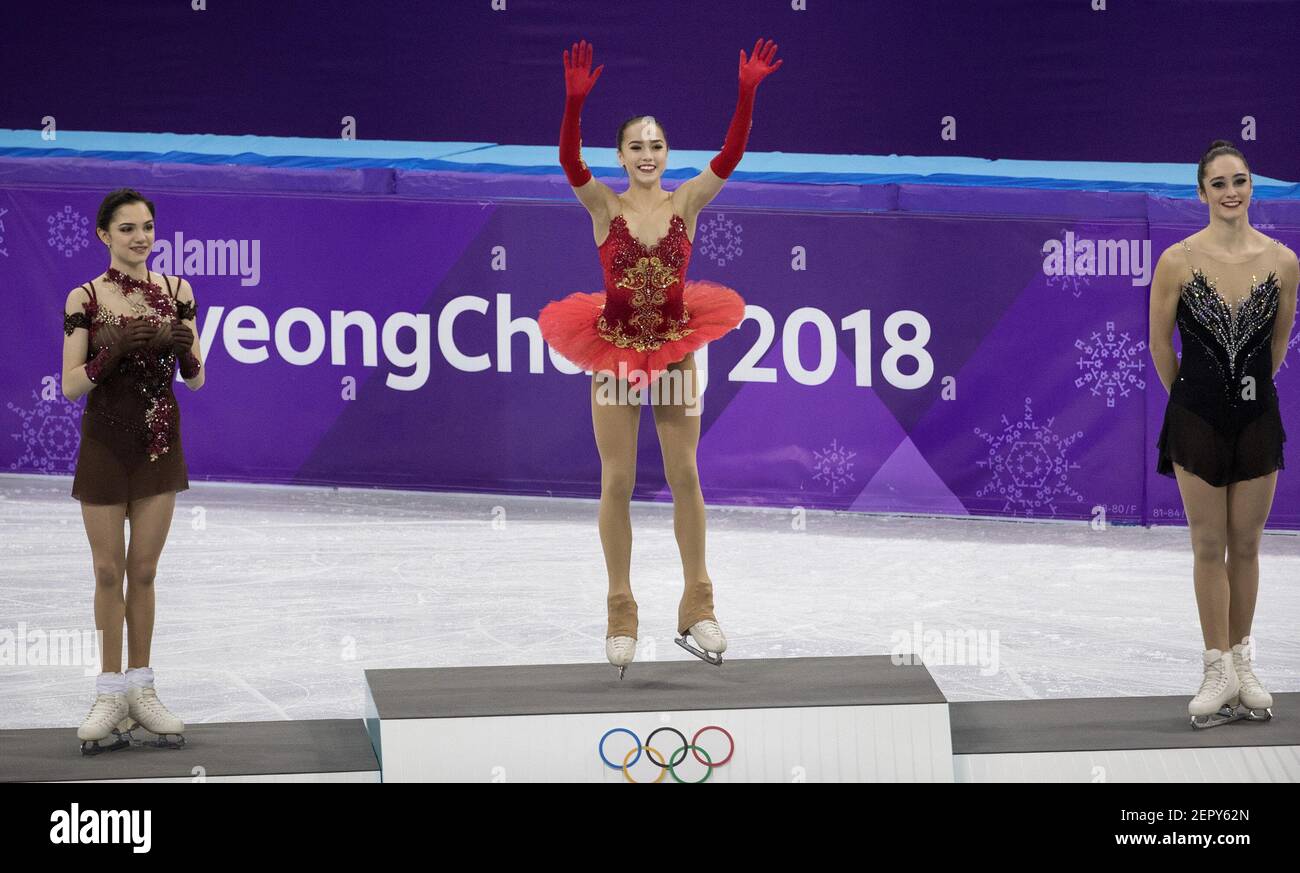 Gold medalist Alina Zagitova, an Olympic Athlete from Russia, jumps on to the podium during the venue ceremony Friday, Feb. 23, 2018, during the 2018 Pyeongchang Winter Olympics at Gangneung Ice Arena. (Photo by Carlos Gonzalez/Minneapolis Star Tribune/TNS/Sipa USA) Stock Photo