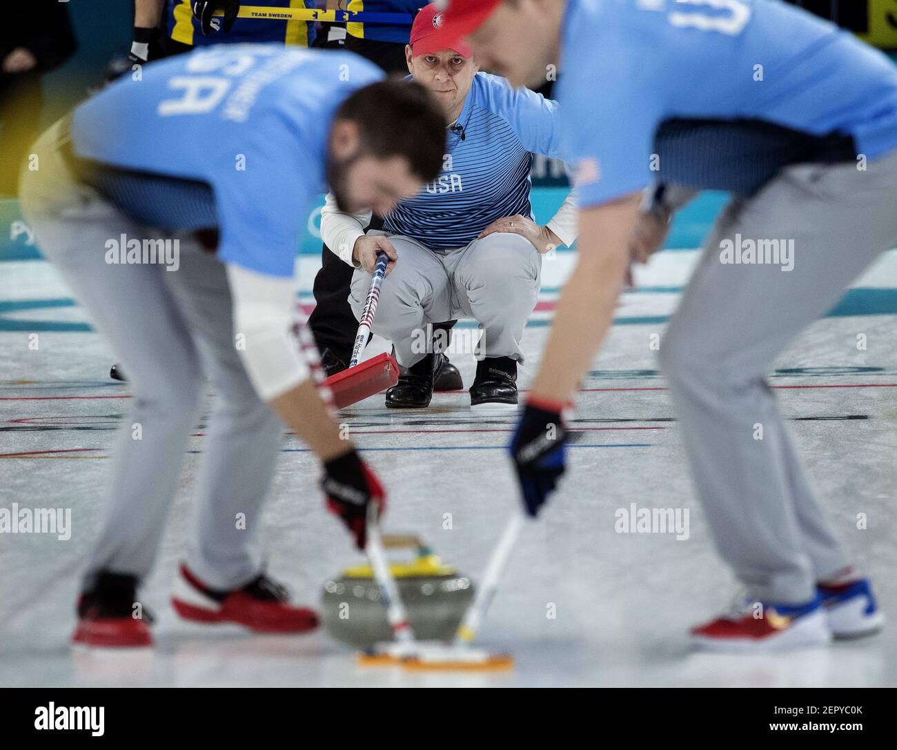 USA team skip John Shuster watches John Landsteiner and Matt Hamilton sweep in front of the rock during the gold-medal match against Sweden on Saturday, Feb. 24, 2018, at the Pyeongchang Winter Olympics' Gangneung Curling Centre. The USA won, 10-7. (Photo by Carlos Gonzalez/Minneapolis Star Tribune/TNS/Sipa USA) Stock Photo