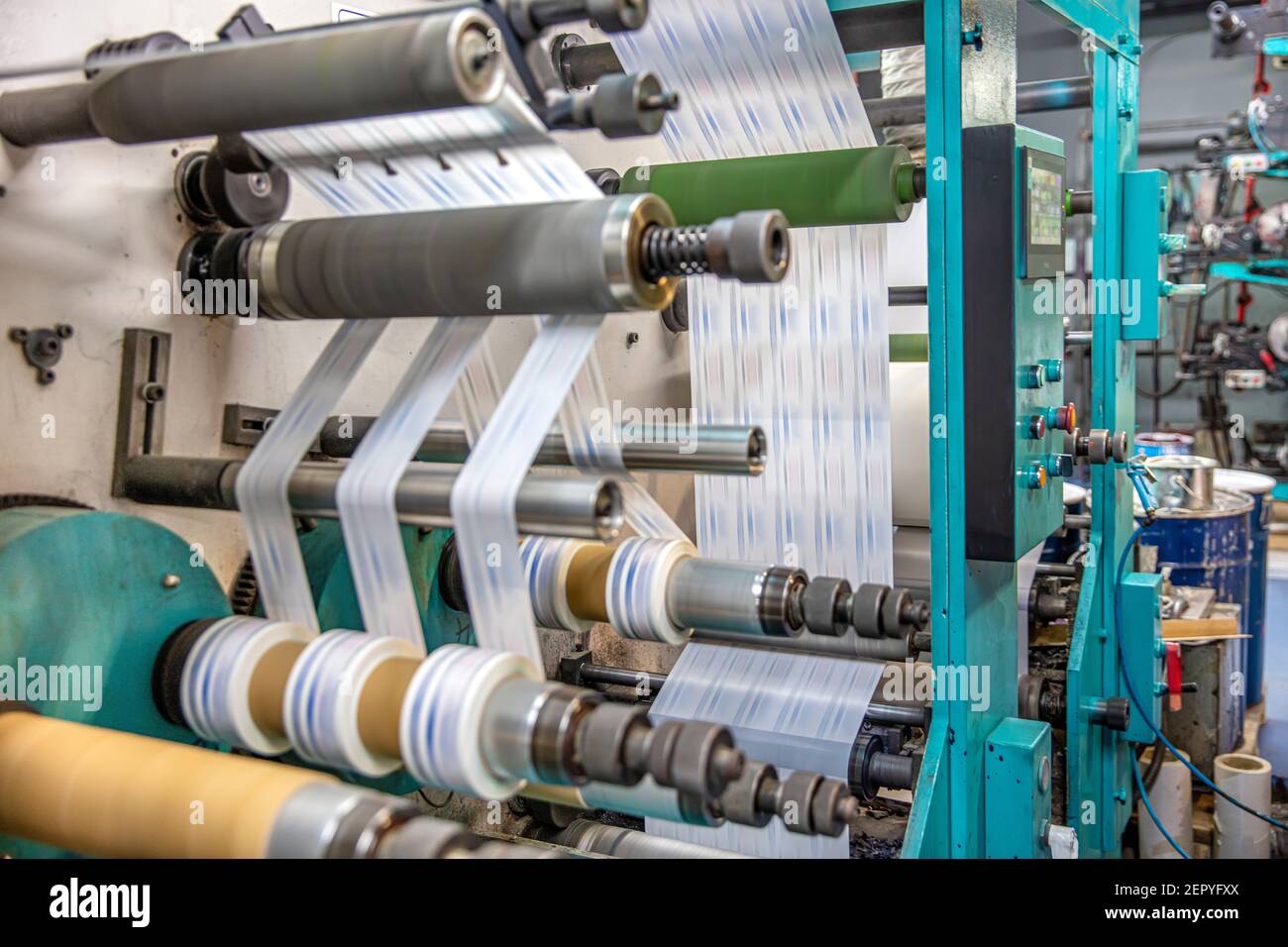 Production of duct tape.Packing tape manufacturing. Strapping Machine