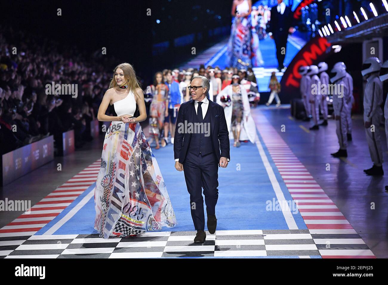 Gigi Hadid and Tommy Hilfiger walk on the runway during the Tommy  Hilfiger's see-now-buy-