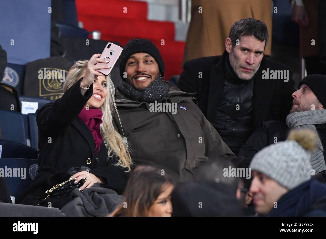 Jalil Lespert, Boris Diaw and his girl friend during the French cup match  between Paris Saint Germain and Olympique Marseille at Parc des Princes in  Paris, France on February 28, 2018. (Photo