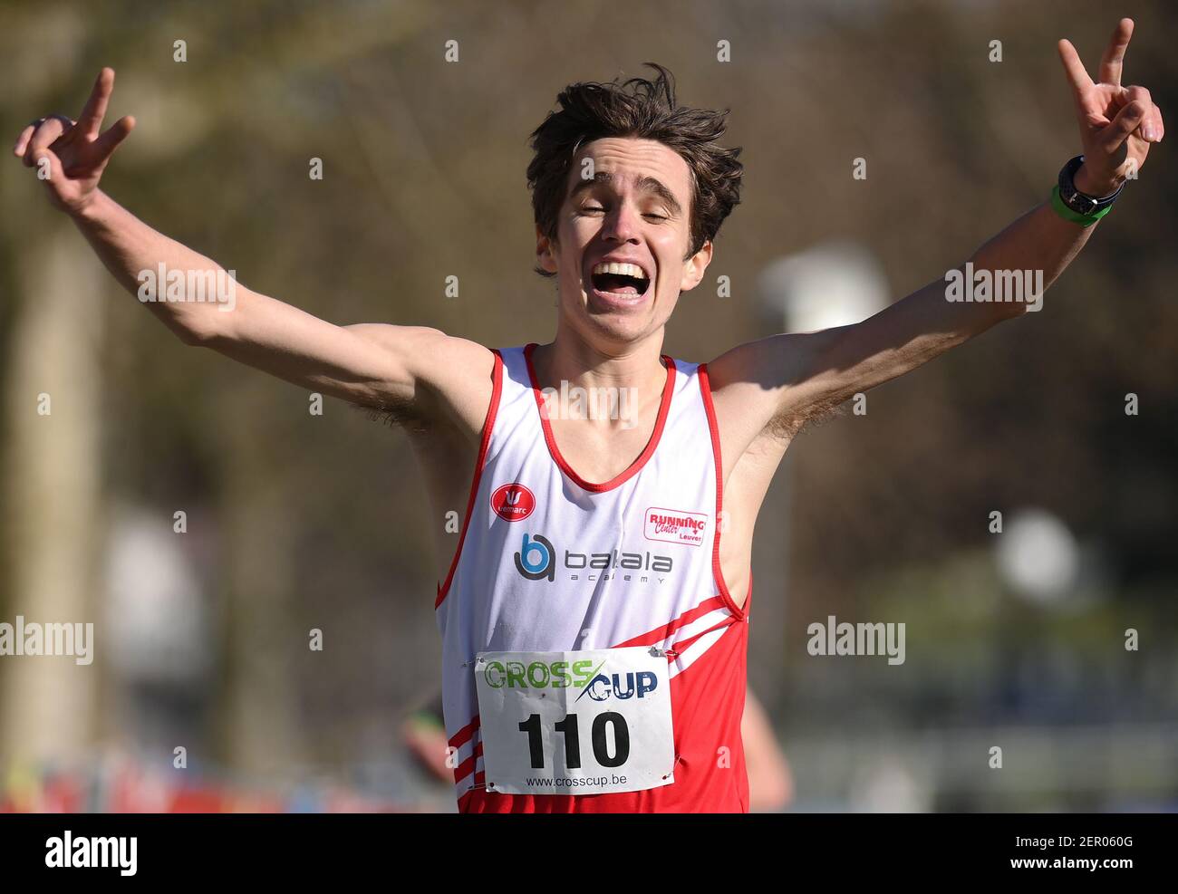 Belgian John Heymans celebrates as he crosses the finish line to win the men's race at the first stage (out of three) of the 'CrossCup' cross country Stock Photo