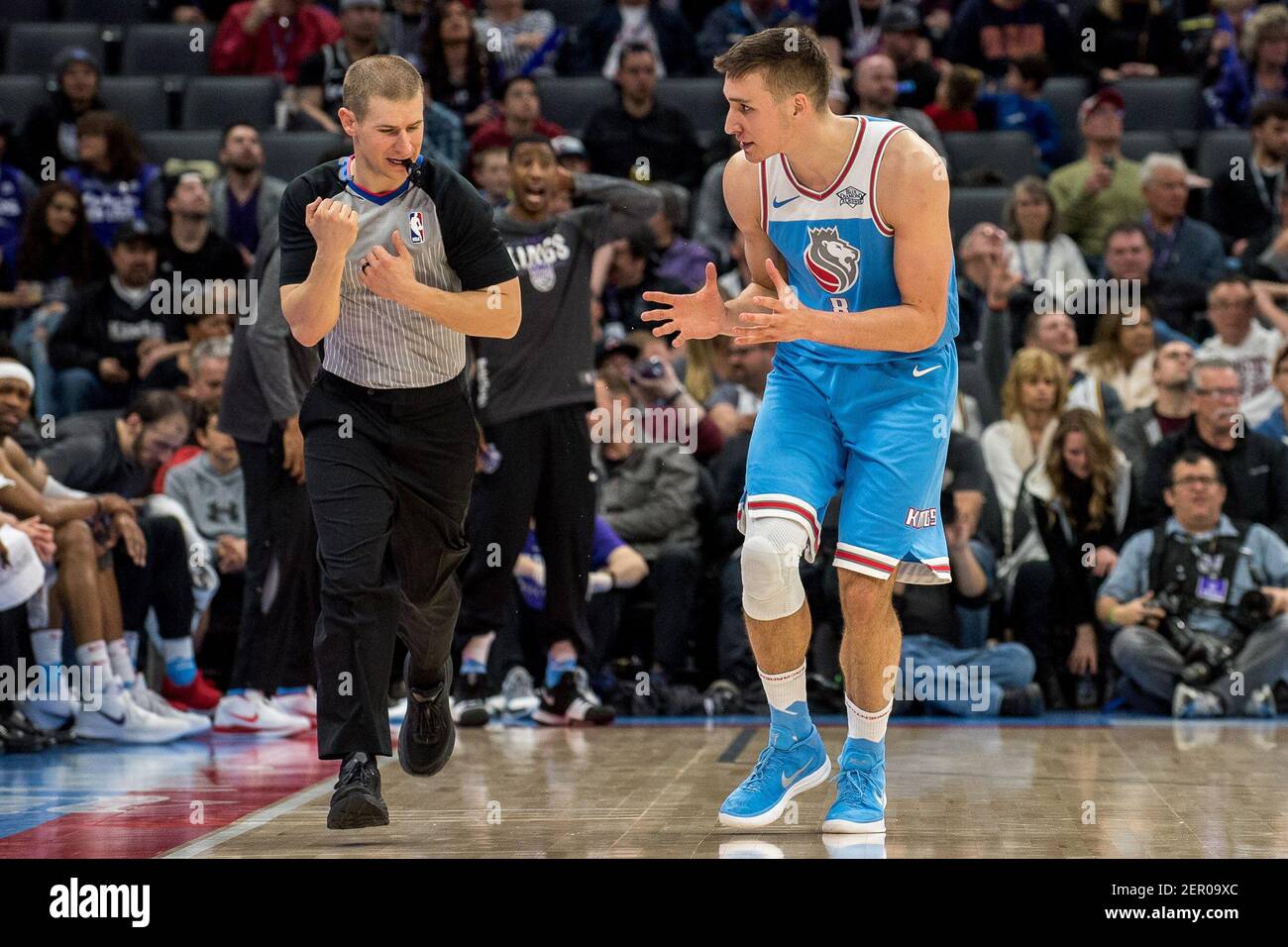 Mar 3, 2018; Sacramento, CA, USA; Sacramento Kings guard Bogdan Bogdanovic ( 8) argues a call with referee Tyler Ford (39) during the second quarter of  the game against the Utah Jazz at