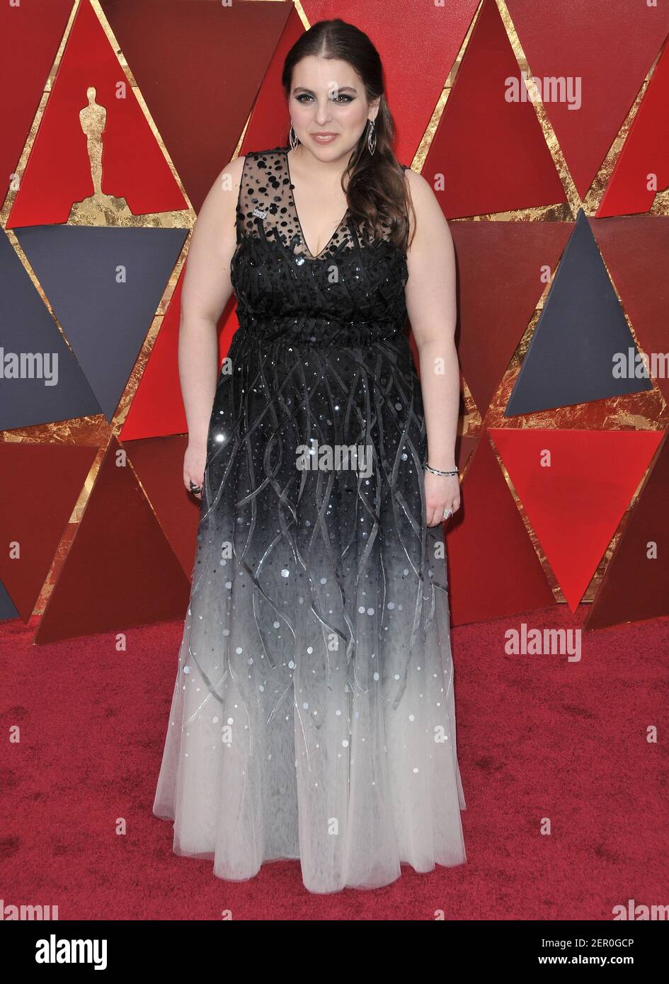 Beanie Feldstein walking on the red carpet during the 90th Academy