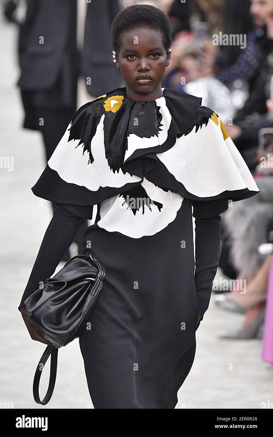 Model Adut Akech walks on the runway during the Valentino Fashion Show ...