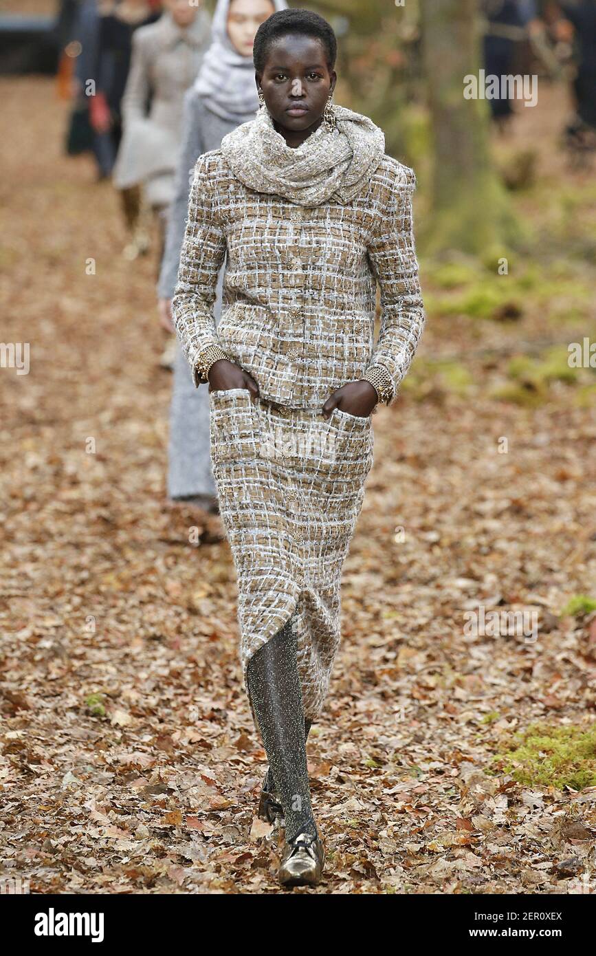 Model Adut Akech walks on the runway during the Chanel Fashion Show during Paris  Fashion Week