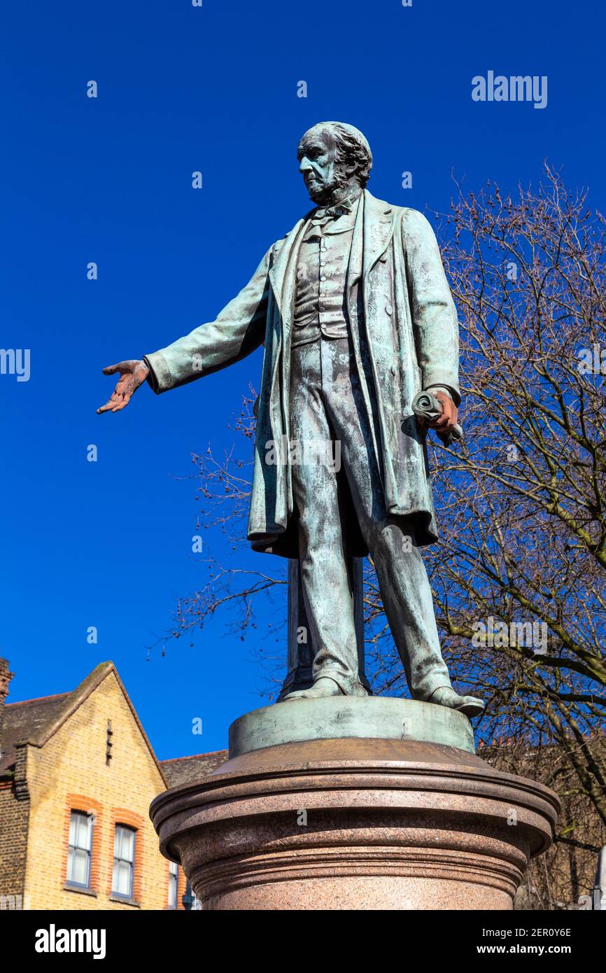 Statue of politician William Ewart Gladstone by Irish sculptor Albert Bruce-Joy in front of Bow Church in Bow, Tower Hamlets, London, UK Stock Photo