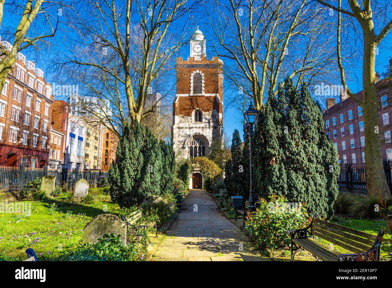 14th century Bow Church with a small churchyard in Bow, Tower Hamlets, London Stock Photo