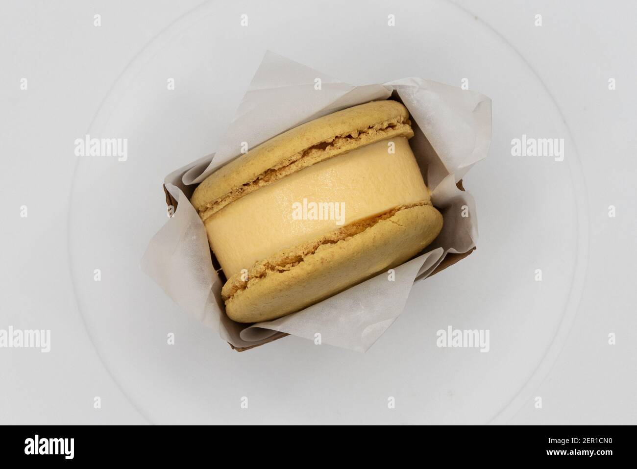 Overhead view of mango Macaron Ice Cream sandwich cookie with very sweet flavor makes perfect dessert after a meal. Stock Photo