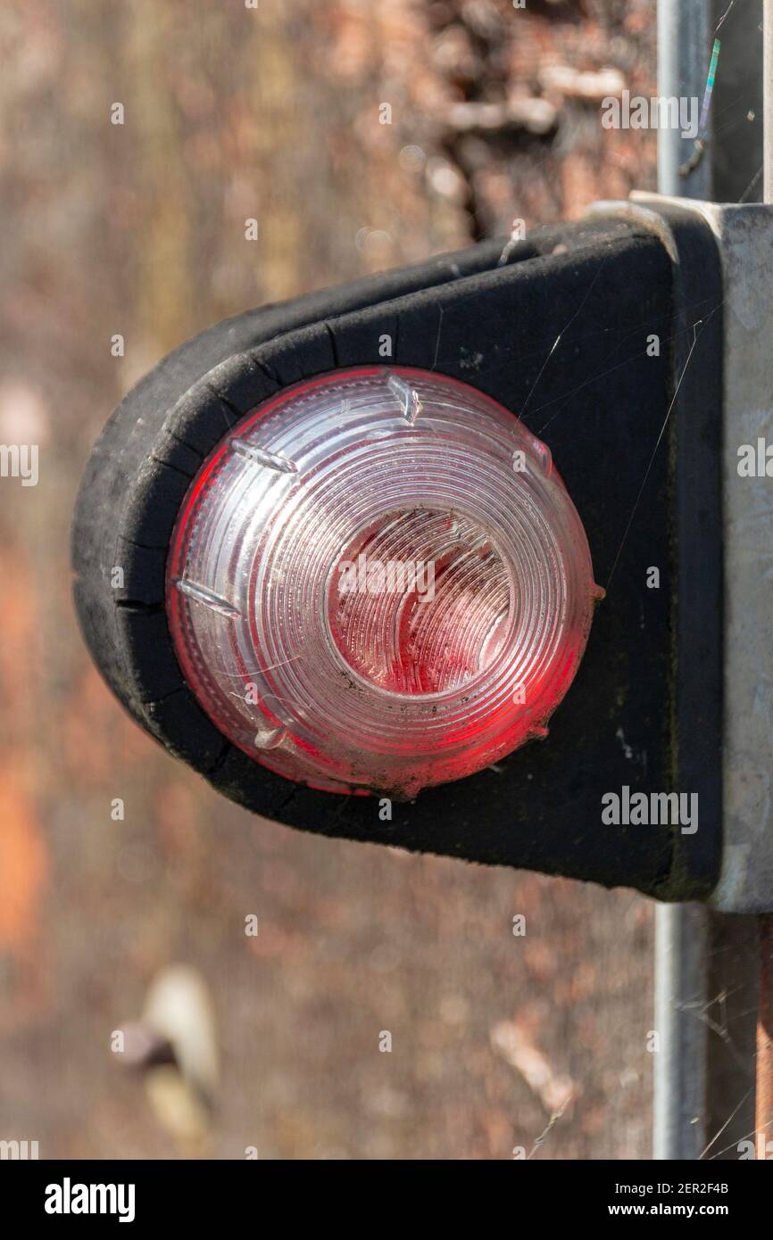 a close up view of a side reflector on the side of a horse trailer Stock Photo