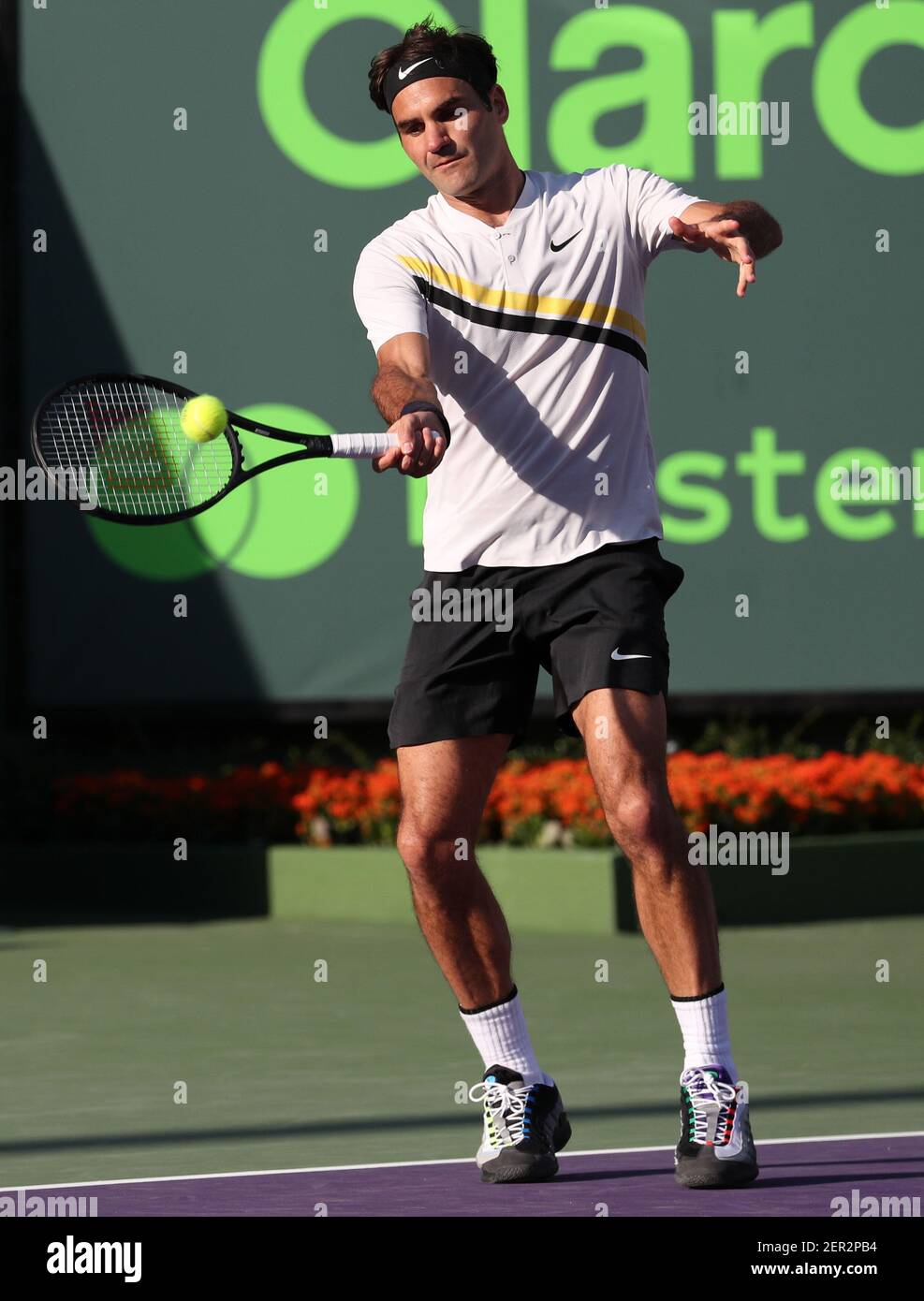 March 24, 2018: Roger Federer from Switzerland plays against Thanasi  Kokkinakis from Australia during an early round of the 2018 Miami Open  presented by Itau professional tennis tournament, played at the Crandon