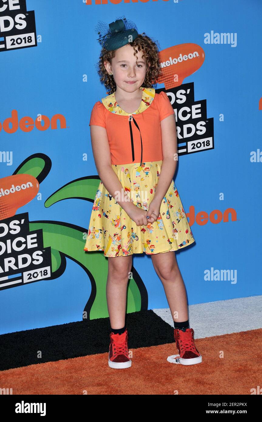 Nev Scharrel walking on the red carpet during the 2018 Nickelodeon Kids