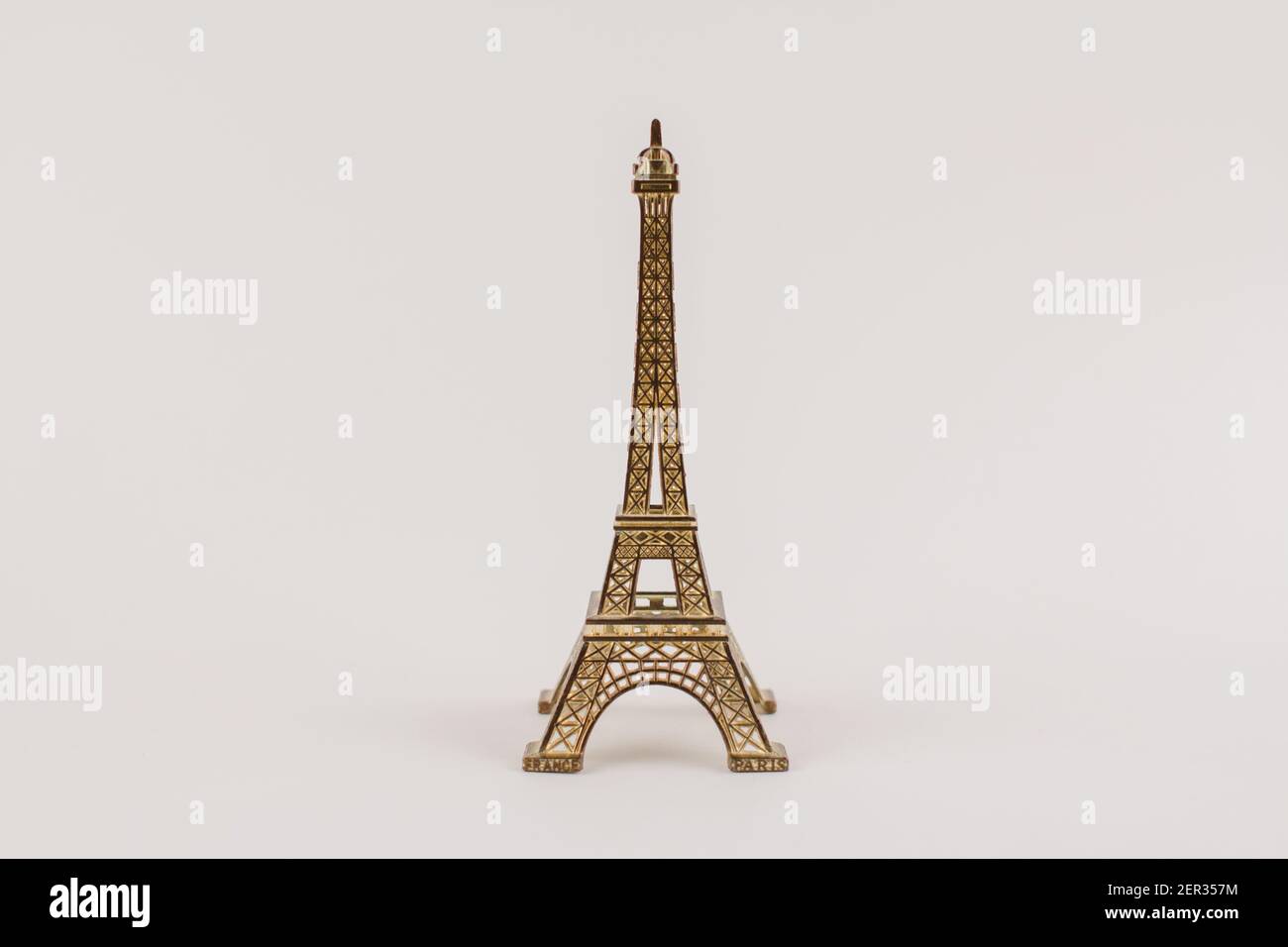 a souvenir eiffel tower on white background Stock Photo - Alamy