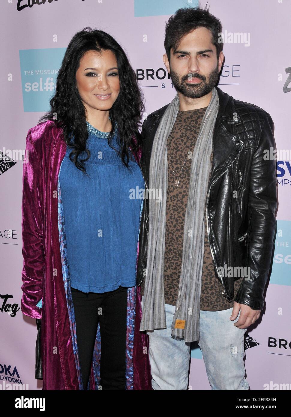 L-R) Kelly Hu and Brayden Pierce at The Museum Of Selfies VIP Grand Opening  held at The Museum of Selfies in Glendale, CA on Thursday, March 29, 2018.  (Photo By Sthanlee B.