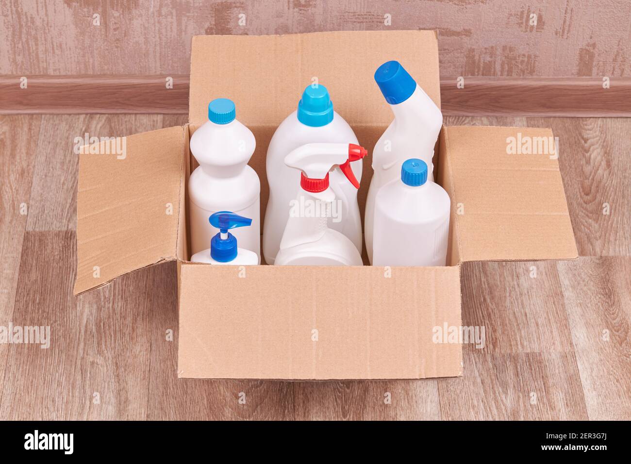 blank cleaning chemicals bottles for housework. product delivery and wash up service concept Stock Photo