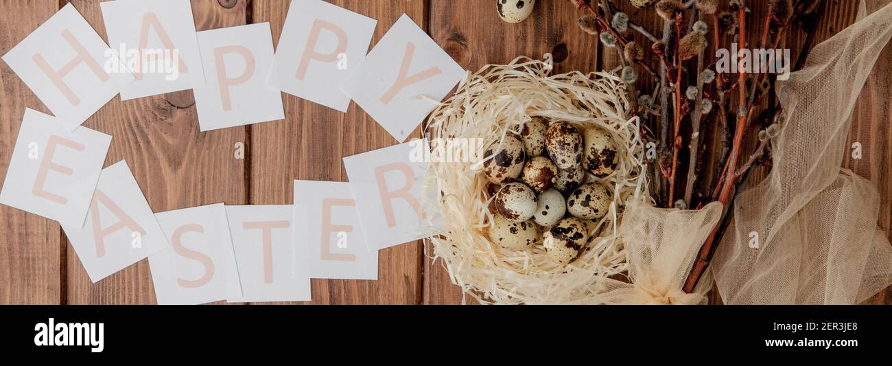 Flat lay composition of quail eggs and card with text Happy Easter on ...