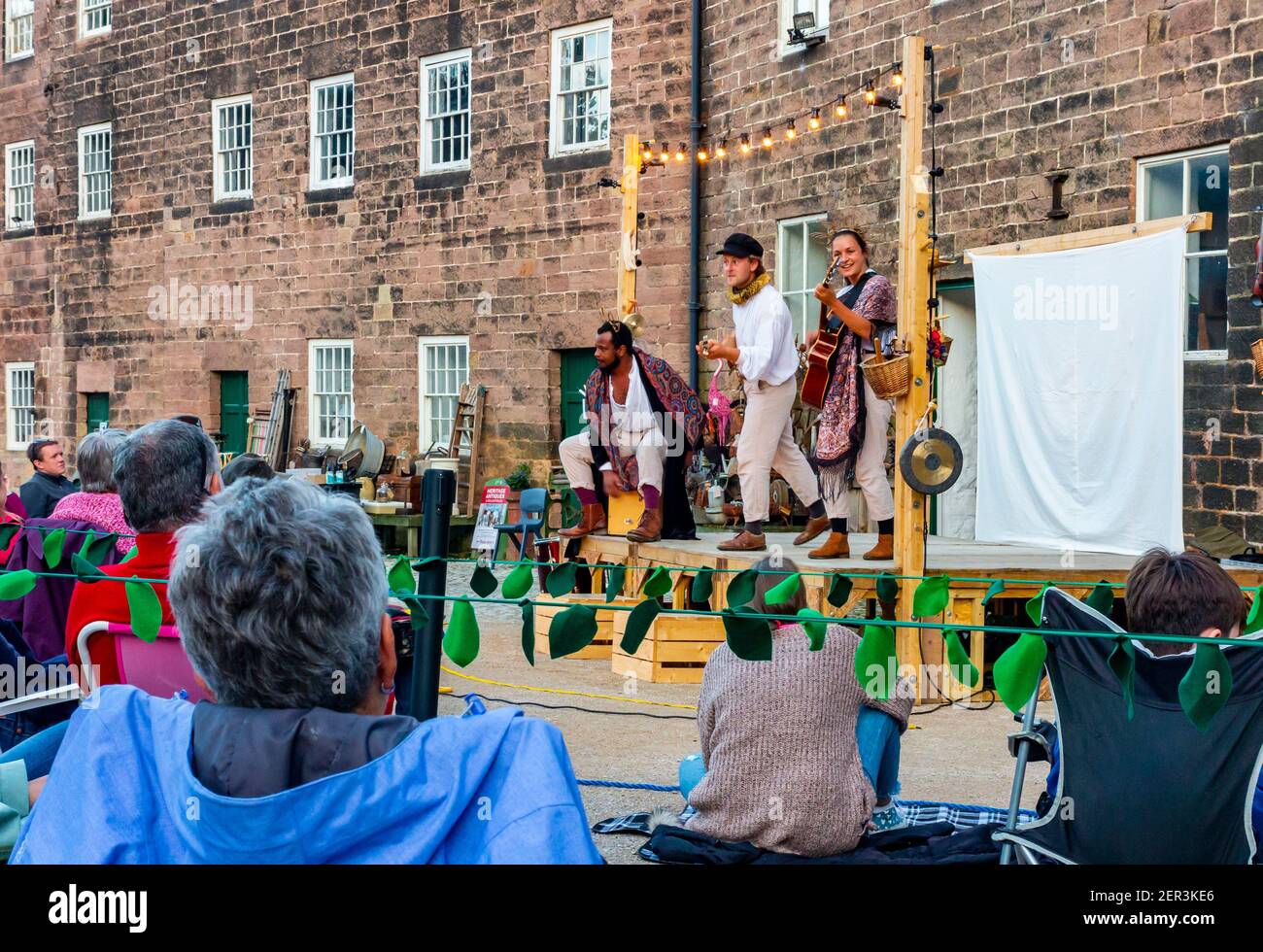 Socially distanced performance of Much Ado About Nothing by Three Inch Fools at Cromford Mill Derbyshire during Coronavirus pandemic August 2020 Stock Photo