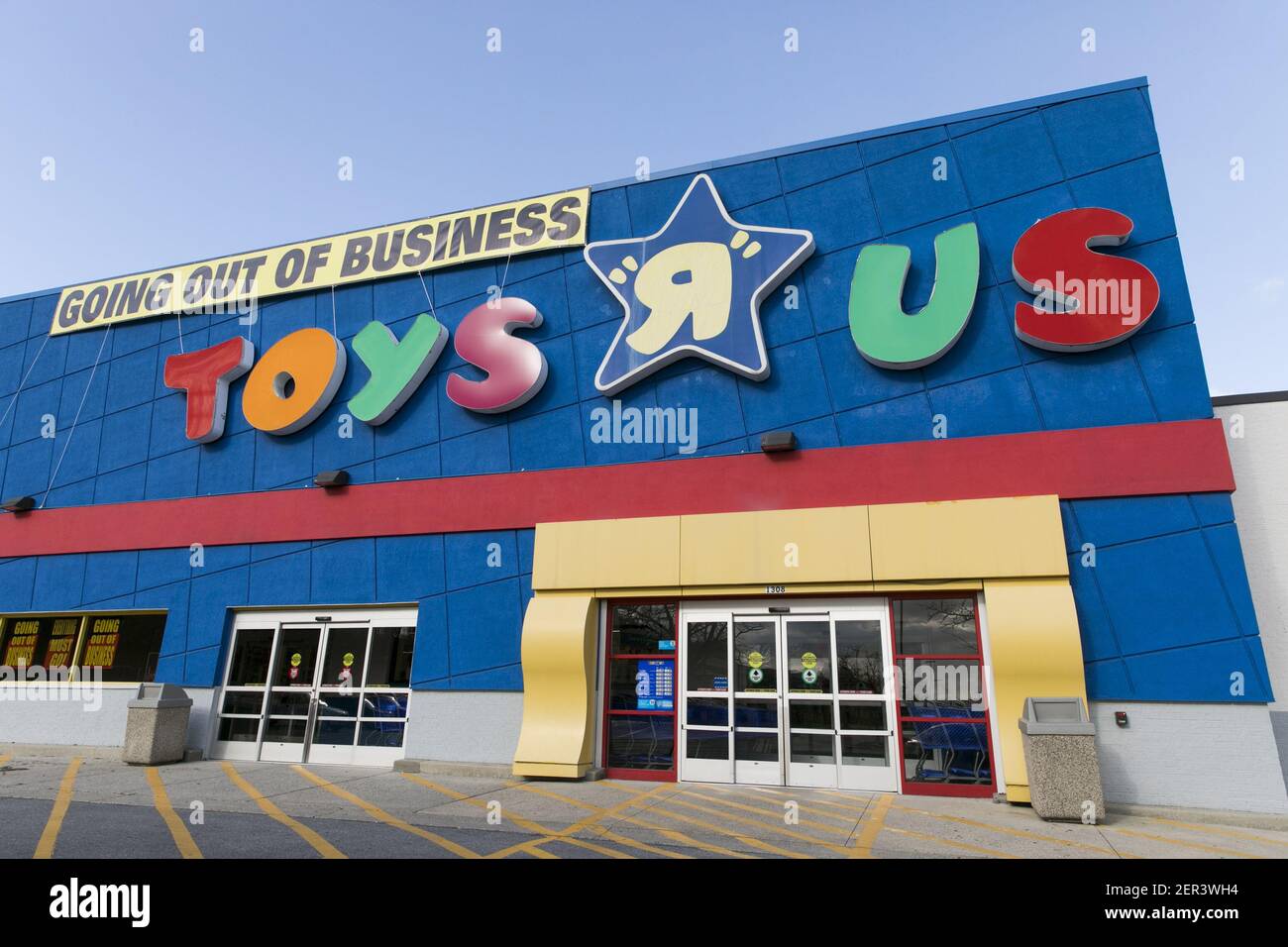 A logo sign outside of a Toys "R" Us retail store in Frederick