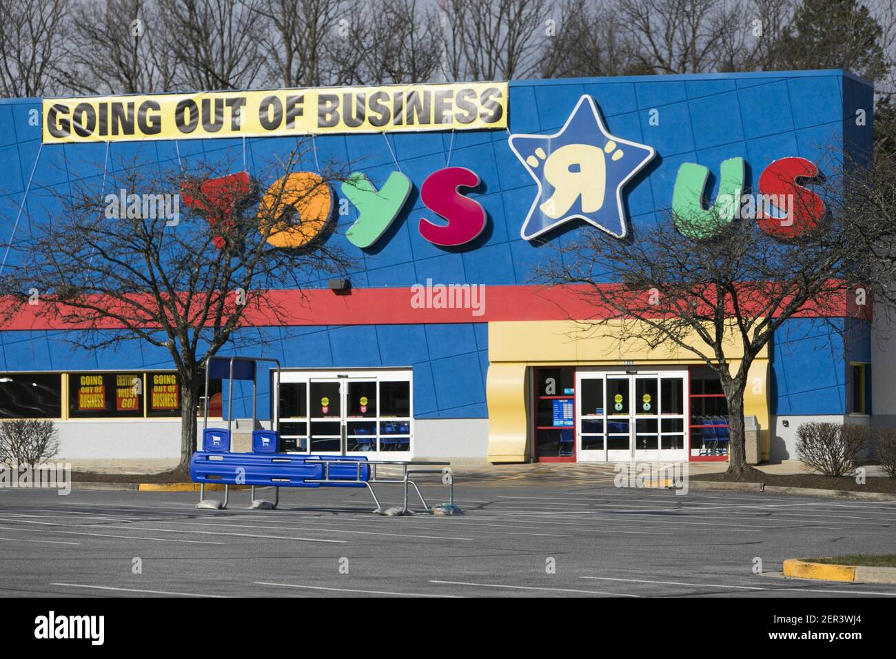 A logo sign outside of a Toys "R" Us retail store in Frederick