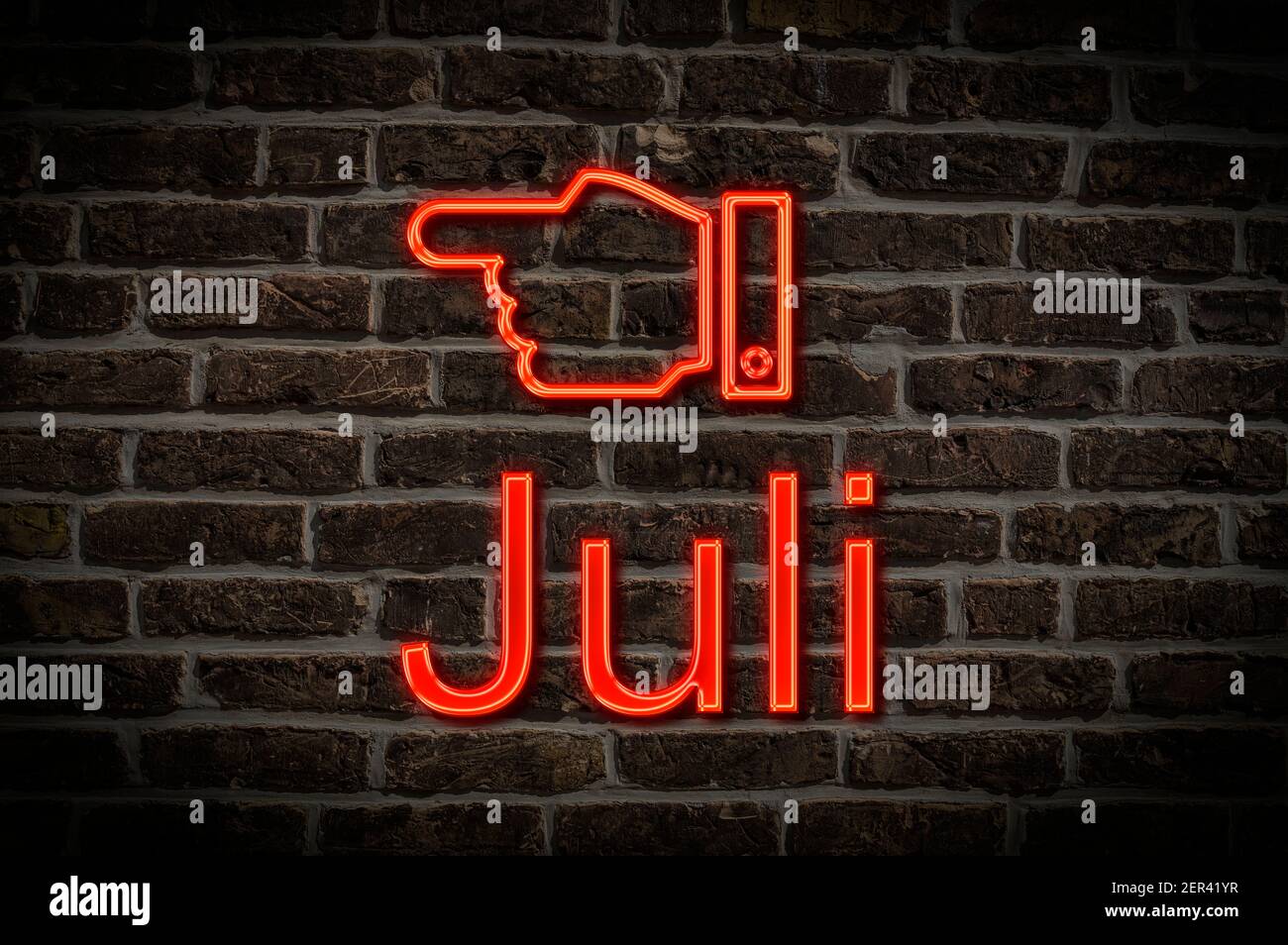 Detail photo of a neon sign on a wall with the inscription Juli (July) Stock Photo