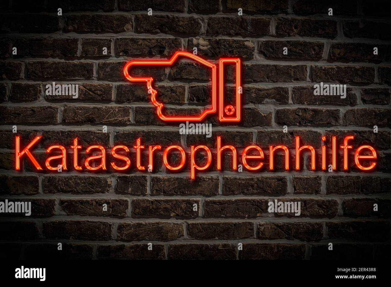 Detail photo of a neon sign on a wall with the inscription Katastrophenhilfe (Emergency relief) Stock Photo