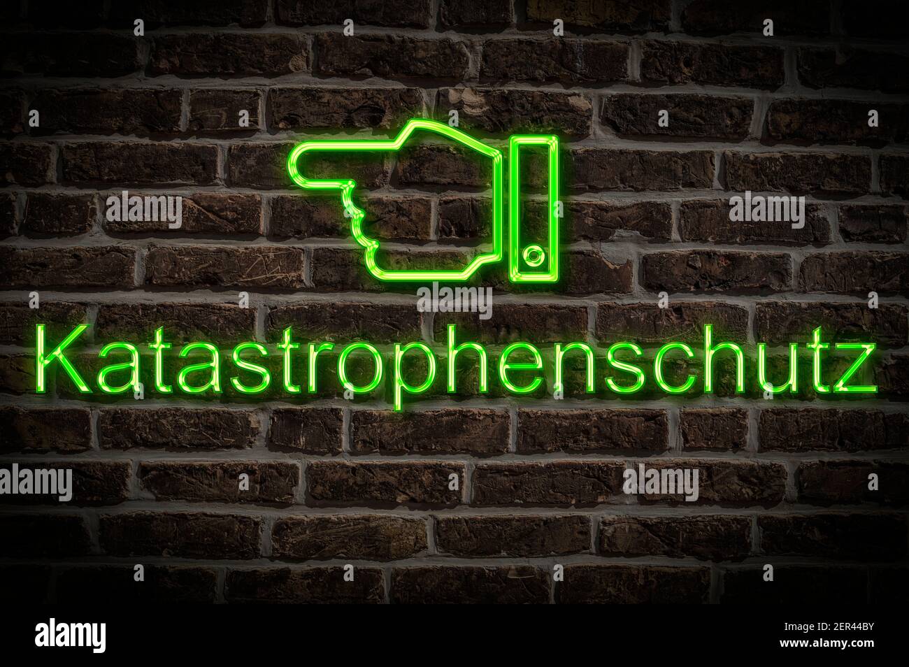 Detail photo of a neon sign on a wall with the inscription Katastrophenschutz (Civil Protection) Stock Photo