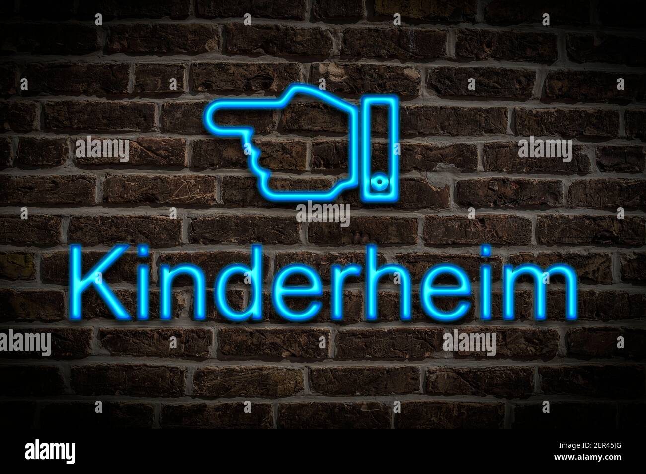 Detail photo of a neon sign on a wall with the inscription Kinderheim (children's home) Stock Photo