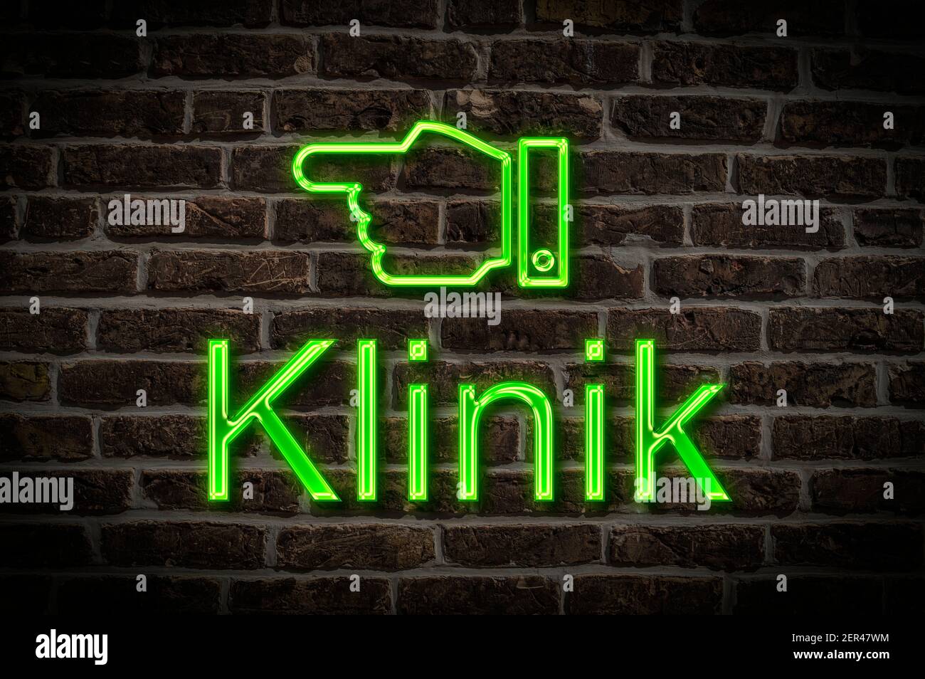 Detail photo of a neon sign on a wall with the inscription Klinik (Clinic) Stock Photo
