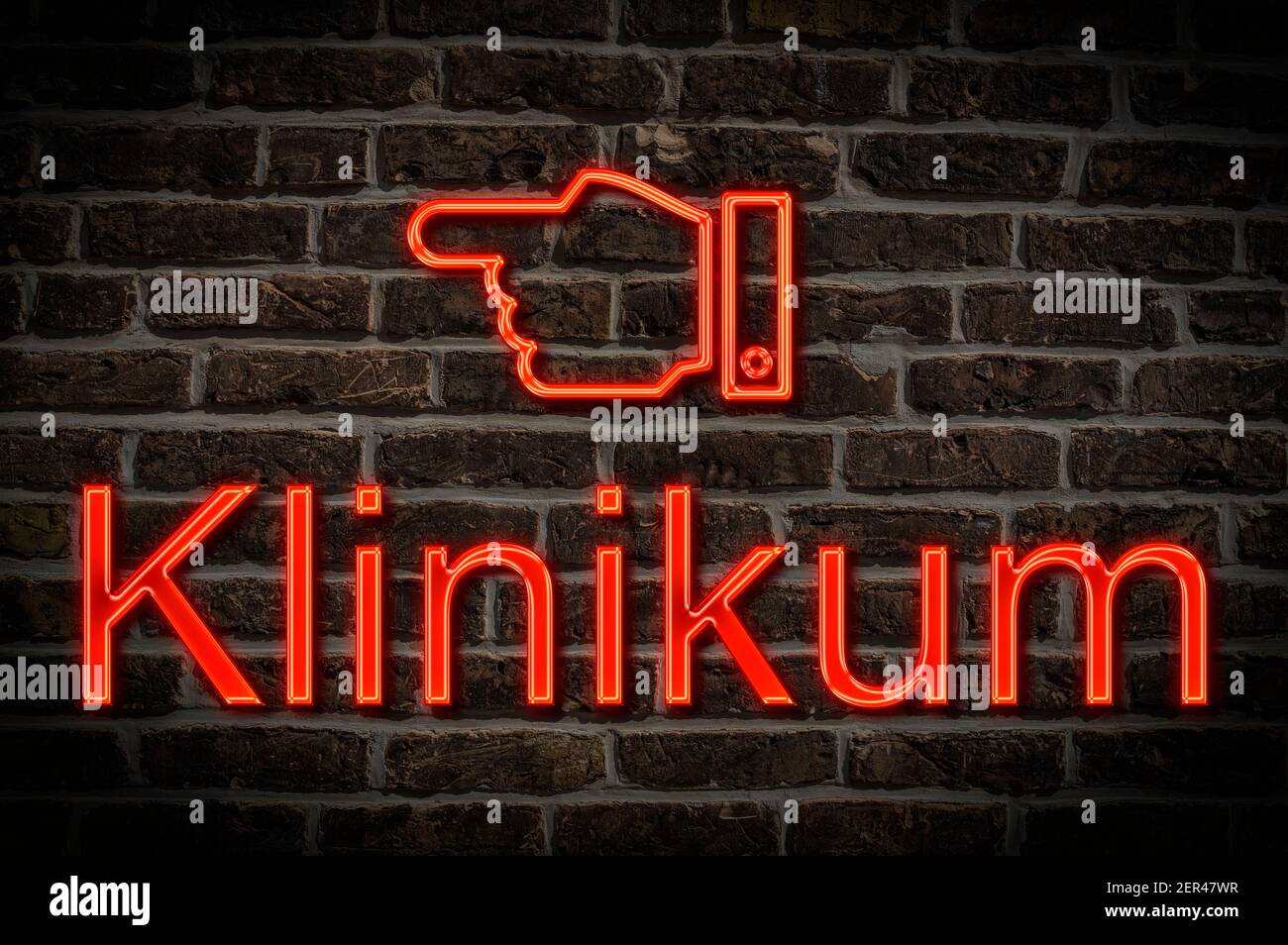 Detail photo of a neon sign on a wall with the inscription Klinikum (Clinic) Stock Photo