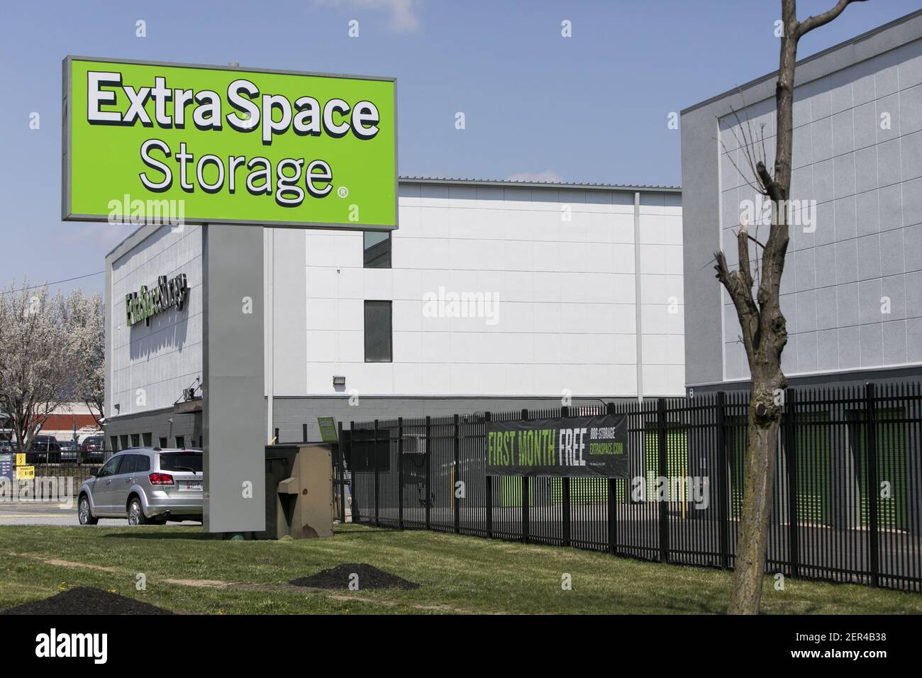 A logo sign outside of a Extra Space Storage location in Wheaton ...