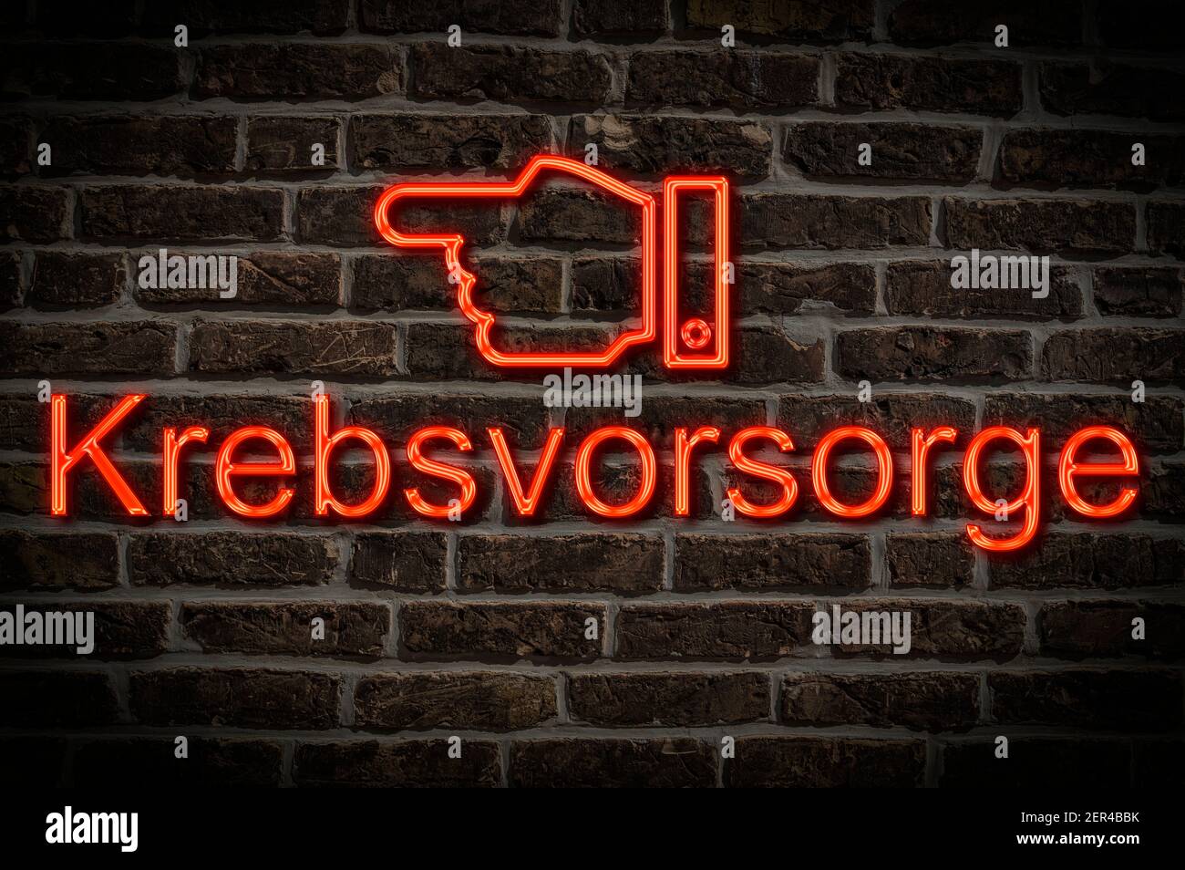 Detail photo of a neon sign on a wall with the inscription Krebsvorsorge (Cancer Prevention) Stock Photo