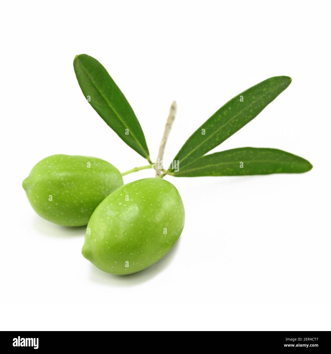 Fresh green olives isolated on white background Stock Photo - Alamy
