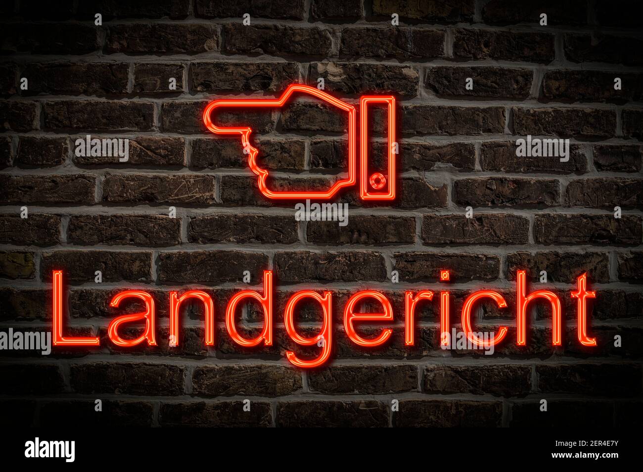 Detail photo of a neon sign on a wall with the german inscription Landgericht (regional court) Stock Photo