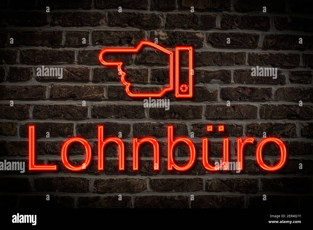 Detail photo of a neon sign on a wall with the inscription Lohnbüro (Payroll office) Stock Photo