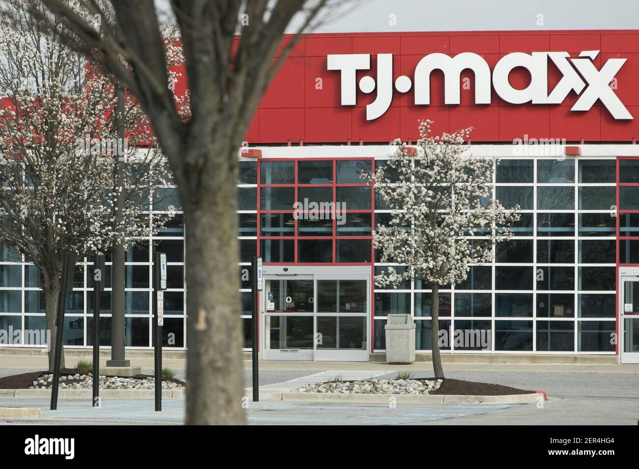 A logo sign outside of a TJ Maxx retail store in Columbia, Maryland on