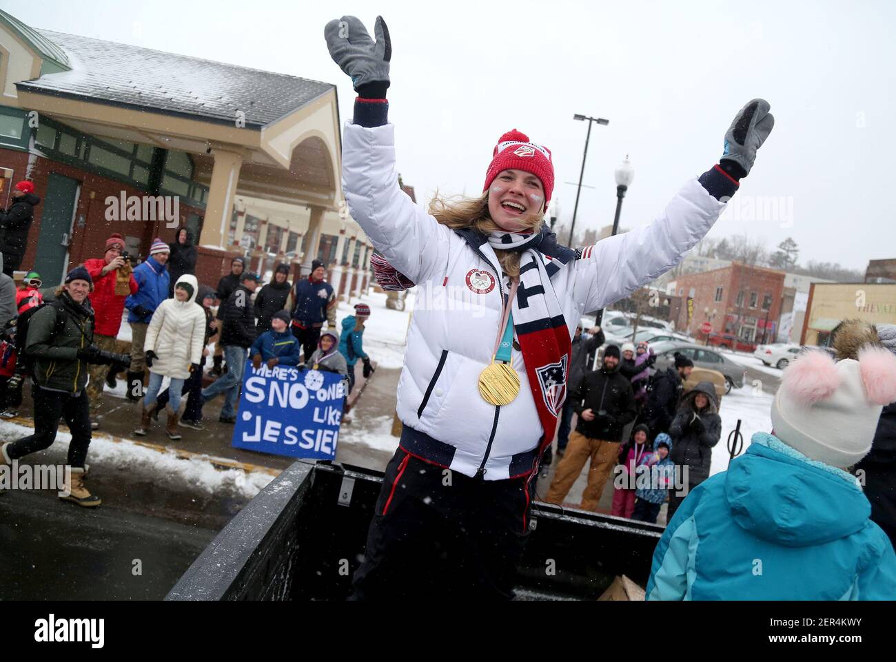 Jessie Diggins, Team USA Olympic gold medalist cross country skier, salutes fans as hundreds brave snowy, blustery weather to honor her with a parade on Saturday, April 14, 2018, in Stillwater, Minn. (Photo by David Joles/Minneapolis Star Tribune/TNS/Sipa USA) Stock Photo