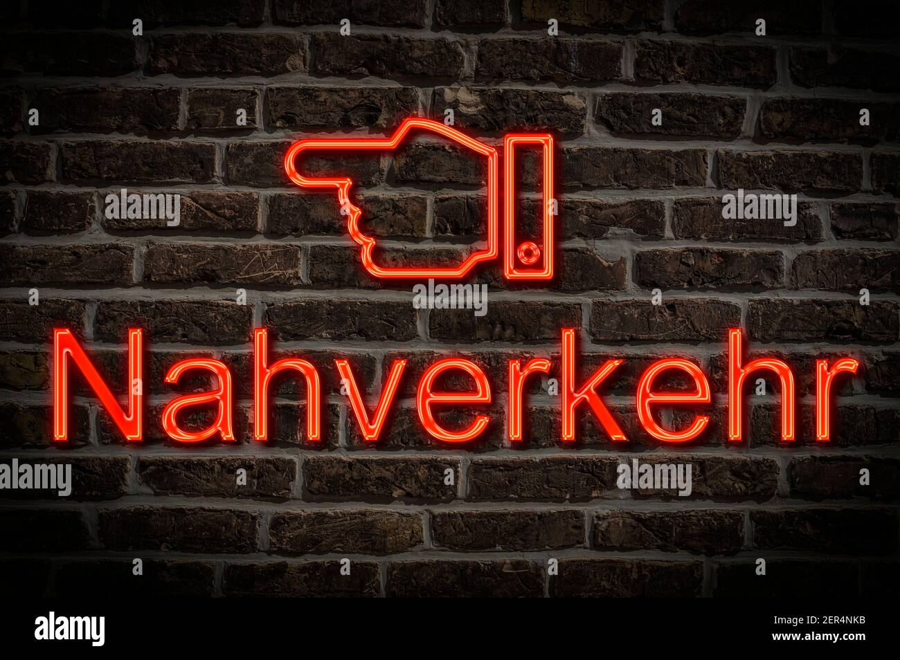 Detail photo of a neon sign on a wall with the inscription Nahverkehr (Local traffic) Stock Photo