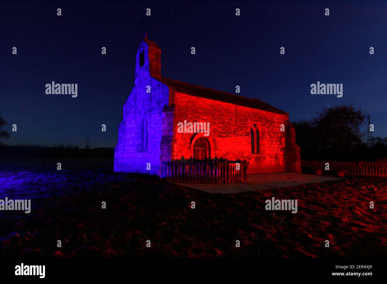 St Mary's Chapel, also known as St Mary's Church at Lead near Tadcaster. The church has been illuminated using a rgb led light Stock Photo