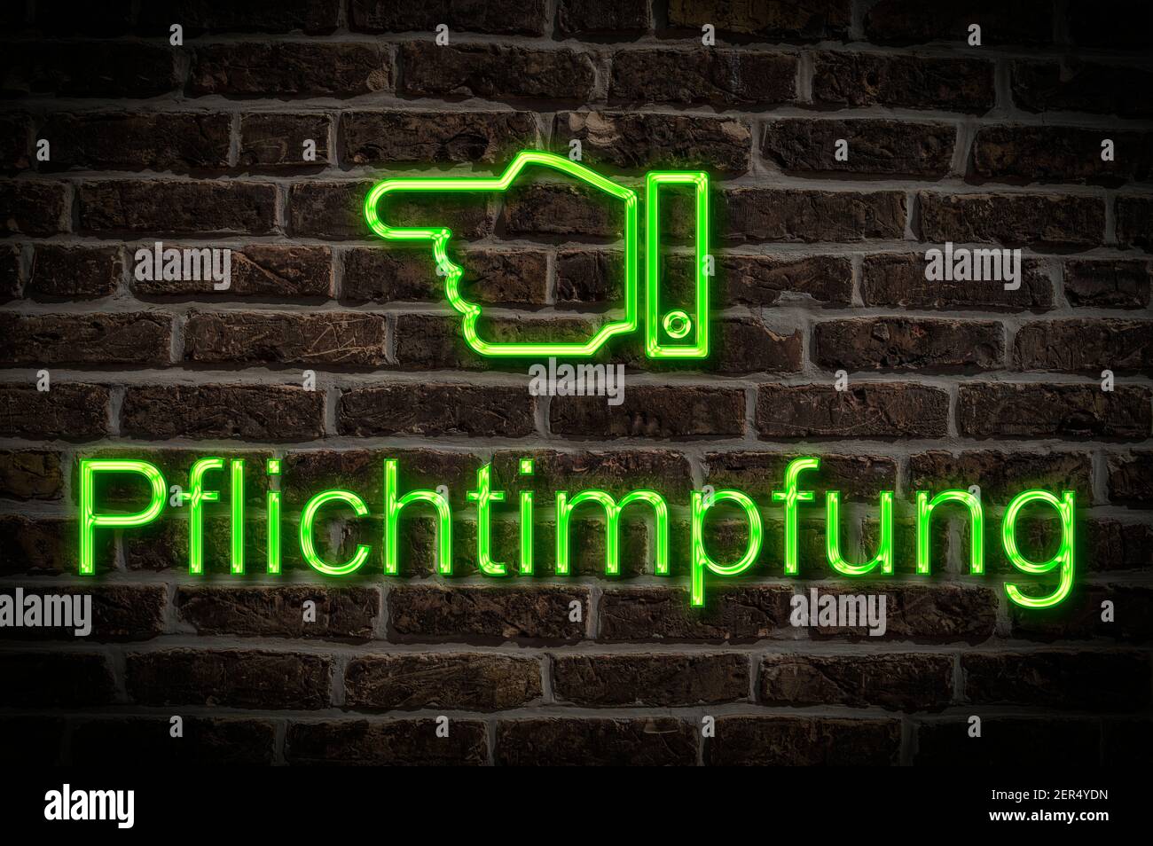 Detail photo of a neon sign on a wall with the inscription Pflichtimpfung (compulsory vaccination) Stock Photo