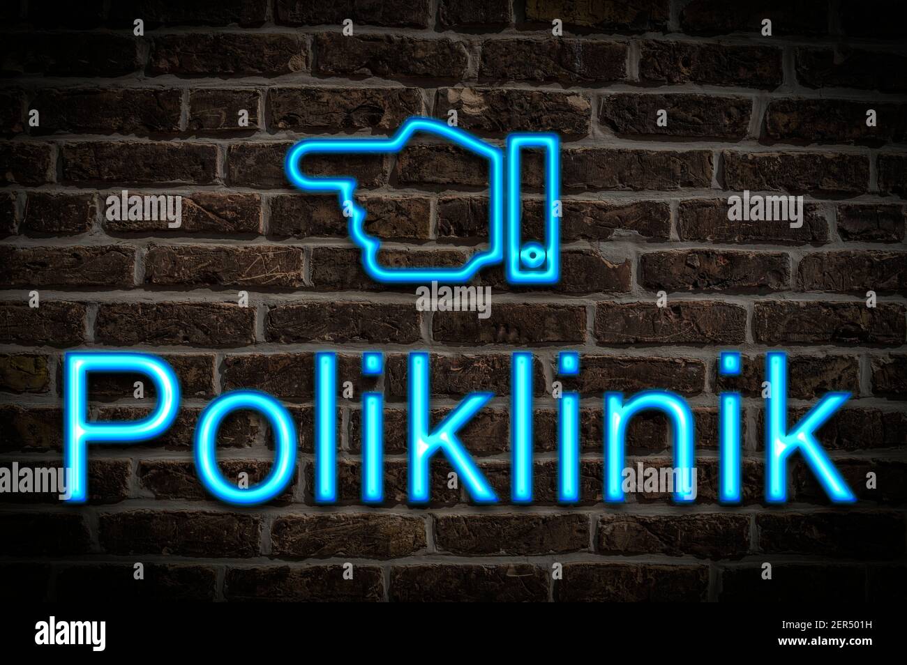 Detail photo of a neon sign on a wall with the inscription Poliklinik (Polyclinic) Stock Photo
