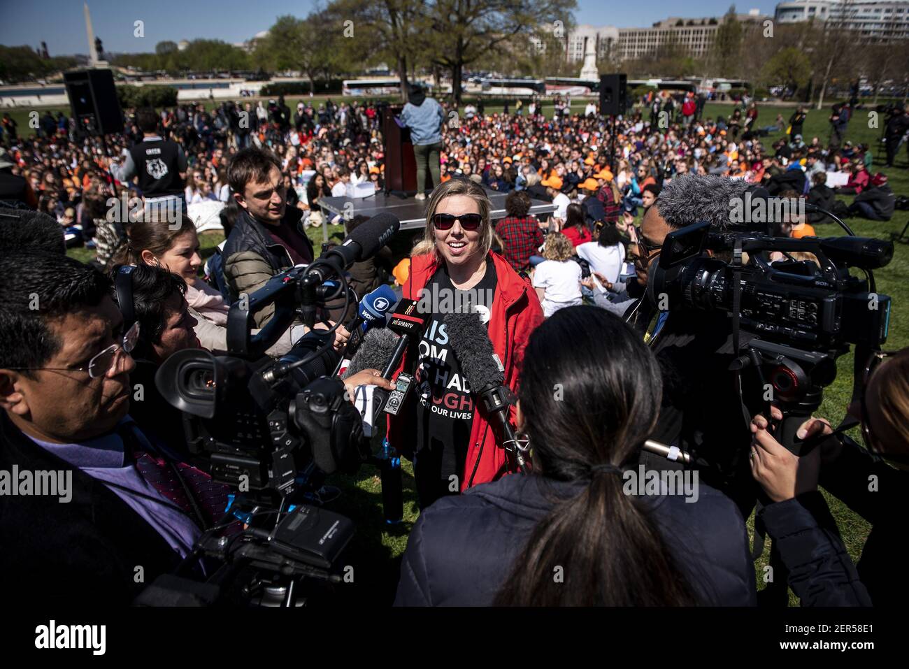Columbine survivor Sally Garrigan speaks to members of the media in