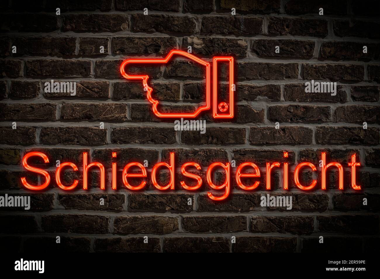 Detail photo of a neon sign on a wall with the inscription Schiedsgericht (Court of Arbitration) Stock Photo